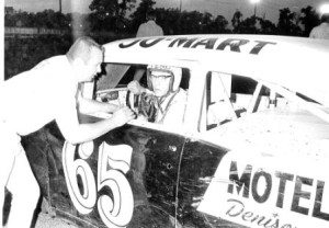 Driver Butch Householder and owner Wayne Meyer confer before the start. 