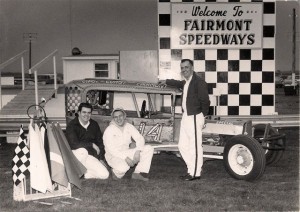 Ron Barton, left, joins Roger Hendrickson, center, and driver Jim Edgington at Fairmont. 