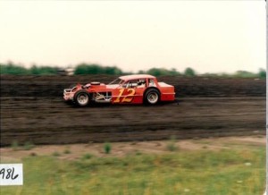 Bob Weber wheeled the #12 Barton Engines IMCA modified in 1986. 